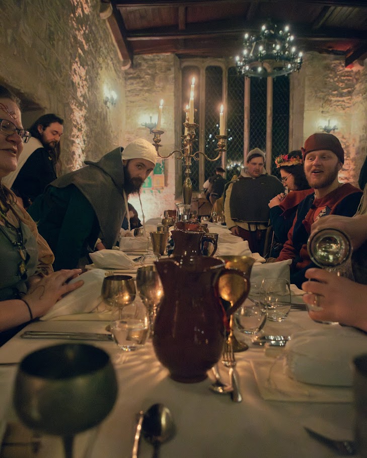 Guests at a table enjoying drinks