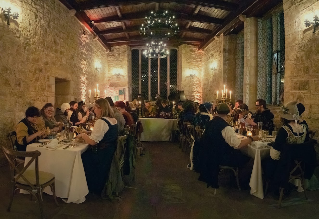 Wide view of guests seated for dinner