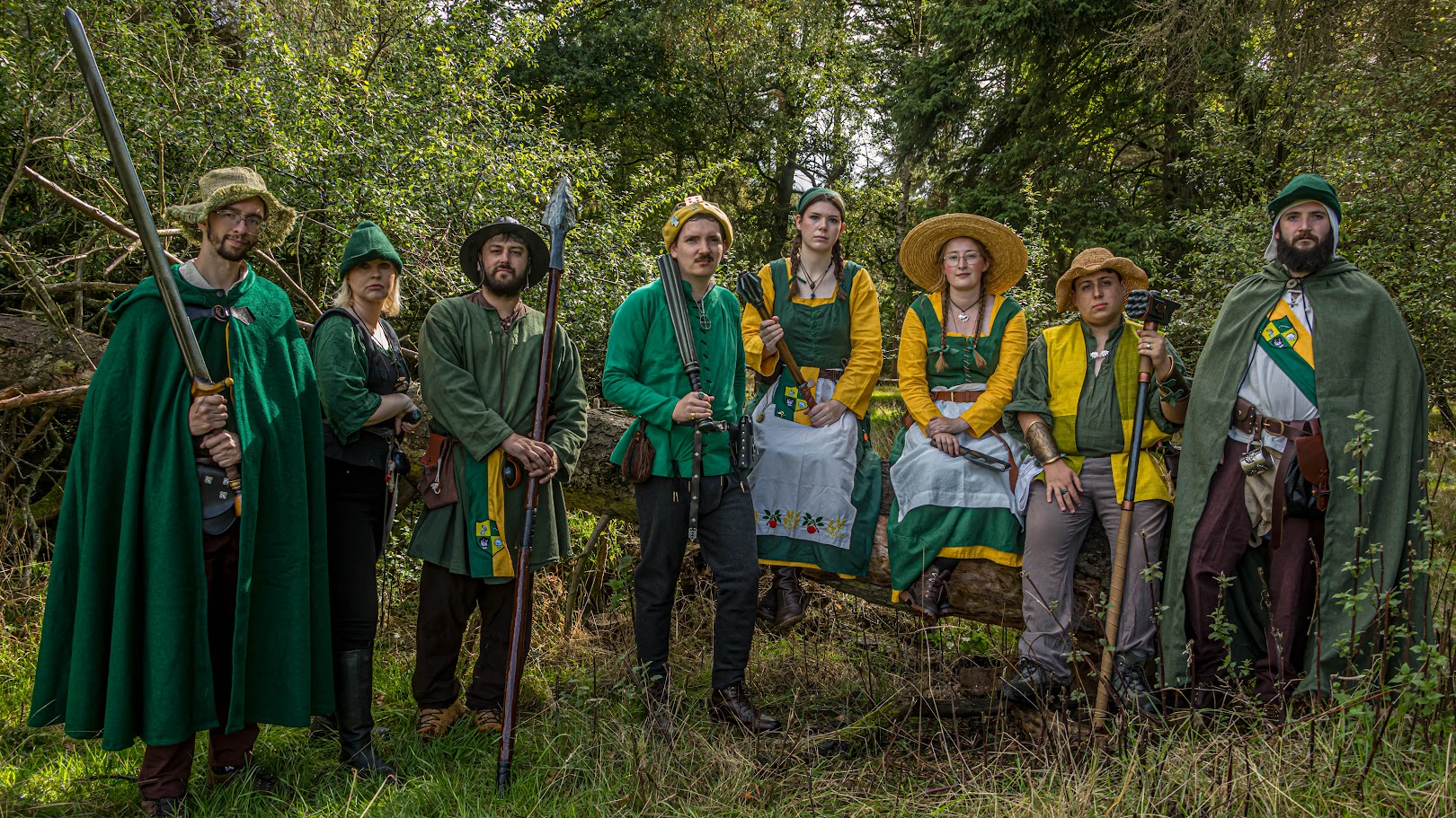 Group portrait of House Crossland in the forest